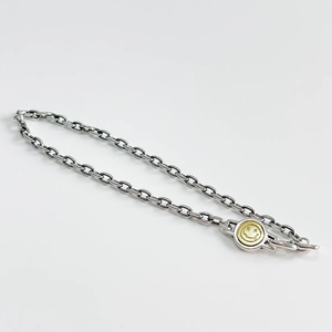 925 Sterling silver chain bracelet with golden star-eyed smiley face charm