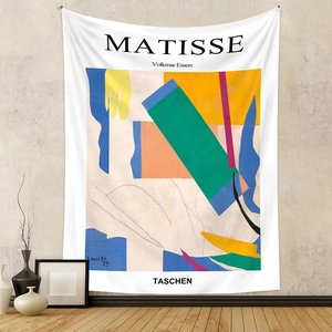Detail of artistic Matisse style abstract wall tapestry in a modern home setting