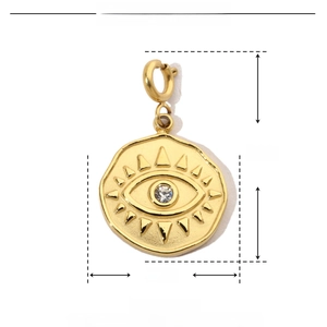 Golden evil eye charm dimensions 23x15mm in stainless steel with rhinestone detail