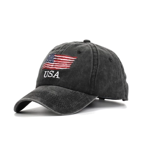 Detail of USA embroidery and flag on charcoal gray washed cotton baseball cap texture