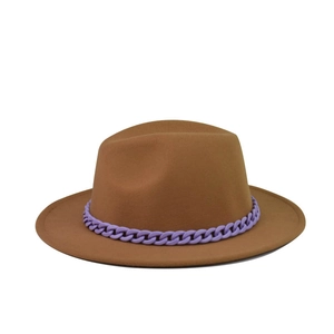 Detail of camel wool fedora hat featuring a vintage purple matte chunky chain decoration