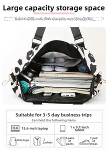 Detail showing cow print travel tote interior capacity for laptop and clothing