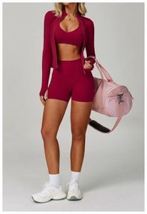 Detailed view of high-waist yoga shorts in deep wine red, featuring quick-dry elastic fabric