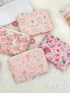 Quilted pink cotton cosmetic bag with cute rabbit and flower prints for daily makeup storage