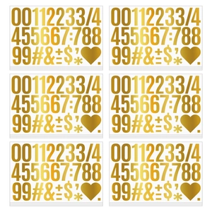 Detail of 2-inch gold metallic stickers featuring numbers and symbols for DIY gift decor
