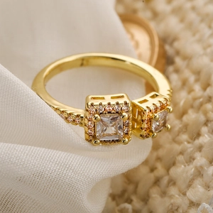 Luxe gold geometric open ring with dual square-cut stones and pave accents