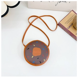 Detail of a brown donut-shaped girls crossbody bag with Hello print and colorful dots