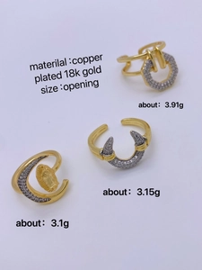 Detailed view of three 18K gold plated copper open rings with geometric zircon designs