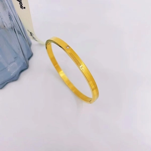 Titanium steel gold bracelet with Endless Love engraving and sparkling cubic zirconia stone