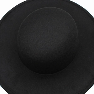 Detailed top view showing the fine felt texture and wide brim of the black wool fedora