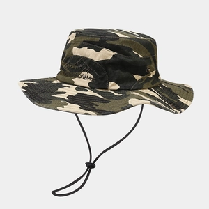 Detail of camouflage boonie hat with embroidery logo, metal vents and windproof cord