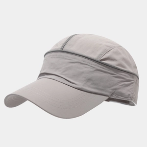 Detailed close-up of quick-dry gray sports hat showing the functional zipper decoration