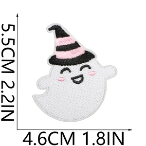 Detail of Halloween ghost embroidery patch with pink hat showing precise stitch texture