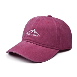Detail showing white mountain and 'BIG SIS' embroidery on washed burgundy baseball cap
