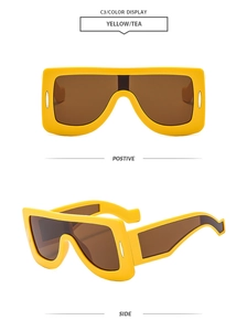 Front and side views of yellow futuristic oversized square sunglasses with tea lenses