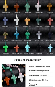 Macro detail of assorted 20x30mm natural gemstone cross pendants for jewelry making
