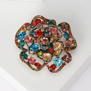 Elegant 3D rose brooch featuring vintage bronze metal and colorful sparkling rhinestones