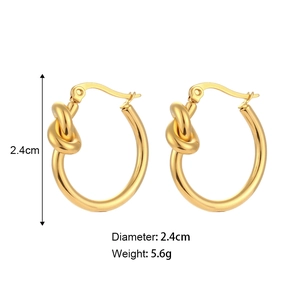 Golden titanium steel knot hoop earrings measuring 2.4cm in diameter for women