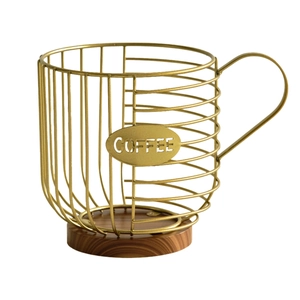 Cup-shaped metal coffee pod basket with wood base and matte gold finish