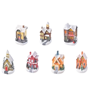 Set of 7 miniature resin Christmas village houses with snowy roofs and colorful designs