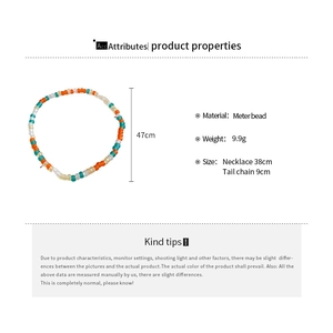 Detail view of multicolored beaded necklace with dimensions 38cm plus 9cm extender chain