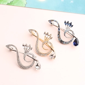 Elegant swan brooches set with crystal rhinestones in silver, gold and blue finishes