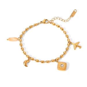 Detail of gold stainless steel bracelet with moon, airplane, square charm and pink bead