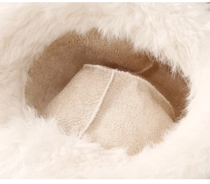 Macro detail of plush faux rabbit fur exterior and soft suede lining on bucket hat