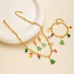 Christmas jewelry set with gold necklace, bracelet, and earrings in festive enamel