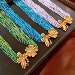 Chaîne de taille bohème multicouche avec pendentif fleur et papillon en strass