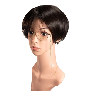 Golden snake bone eyewear chain with adjustable silicone loops shown on a model