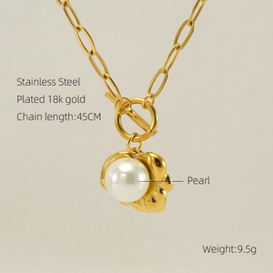 Elegant 18K gold-plated stainless steel necklace with pearl flower pendant on warm background