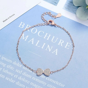 Elegant S925 rose gold bow bracelet with sparkling zircons for a minimalist style