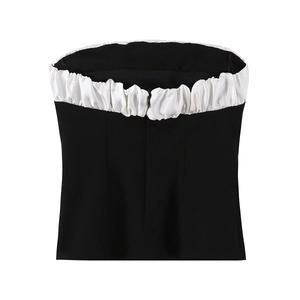 Women's black and white contrast tube top with satin bow trim and back zipper detail