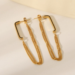 Elegant 18k gold chain tassel earrings with black geometric accents for a modern look