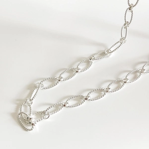 Minimalist 925 sterling silver twisted oval chain necklace on a clean white background
