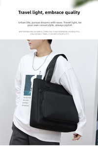 Water-resistant black nylon messenger bag shown worn crossbody for daily business use