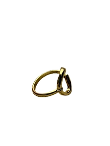 Minimalist knot 925 sterling silver ring in golden finish on a clean white background