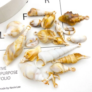 Acrylic seashell pendants in amber and cream hues for DIY necklaces and jewelry