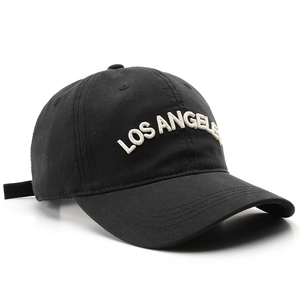 Black cotton baseball cap with white Los Angeles 3D embroidery on a white background