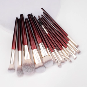 Professional 14-piece synthetic makeup brush set with gradient handles and gold ferrules