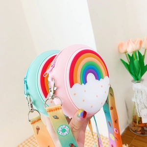 Close-up of pink and green silicone donut bags with rainbow decor and printed straps