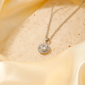 Elegant geometric round sunflower pendant necklace with silver finish and cubic zirconia
