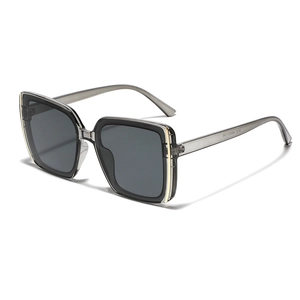 Square grey translucent frame sunglasses with dark lenses and minimalist metal hardware