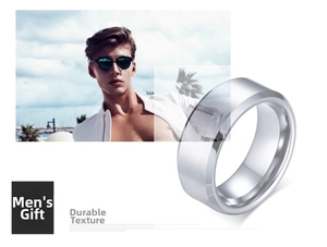 Detail view of silver brushed stainless steel ring with beveled edges for men