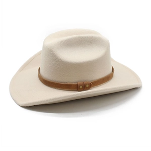 Detail of cream western cowboy hat featuring brown leather band and gold metal rivets
