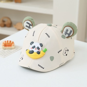 Detail of baby beret with cute plush ears and panda banana patch in cream white