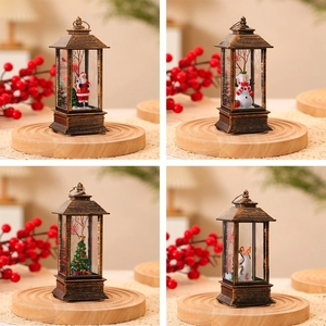 Close-up of vintage bronze Christmas lanterns with Santa, Snowman, and Tree scenes