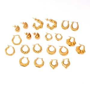 Collection of golden stainless steel hoop earrings and studs with polished textures
