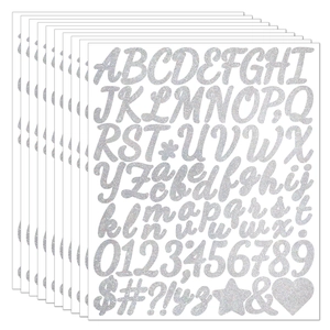 Close-up of glitter silver alphabet and number stickers for DIY graduation cap gifts